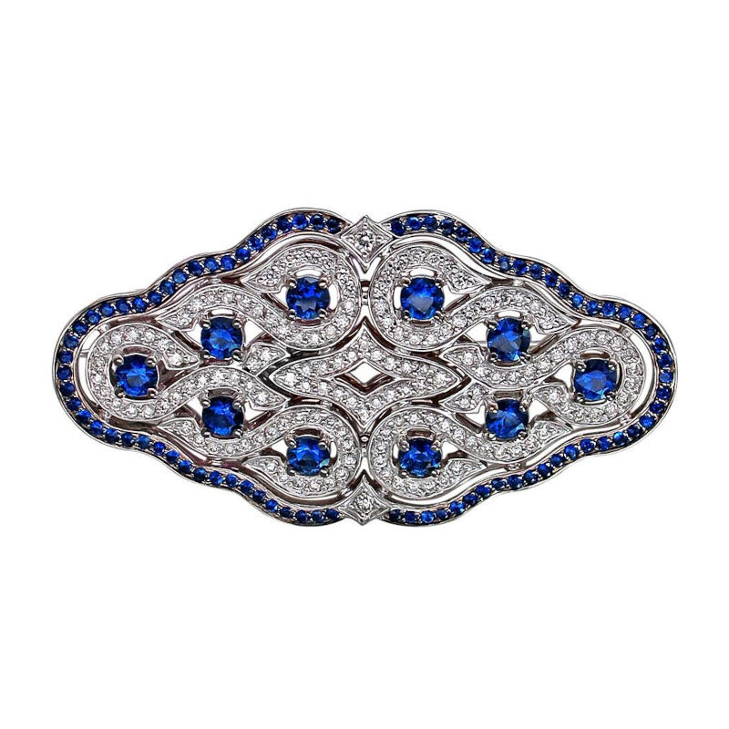 Брошь из белого золота 750 пробы с бриллиантами и сапфирами 01Ш670232-1